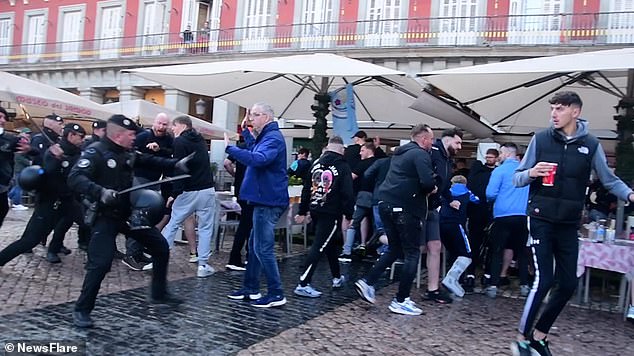  Chelsea and Manchester City fans are filmed fighting on the streets of Madrid