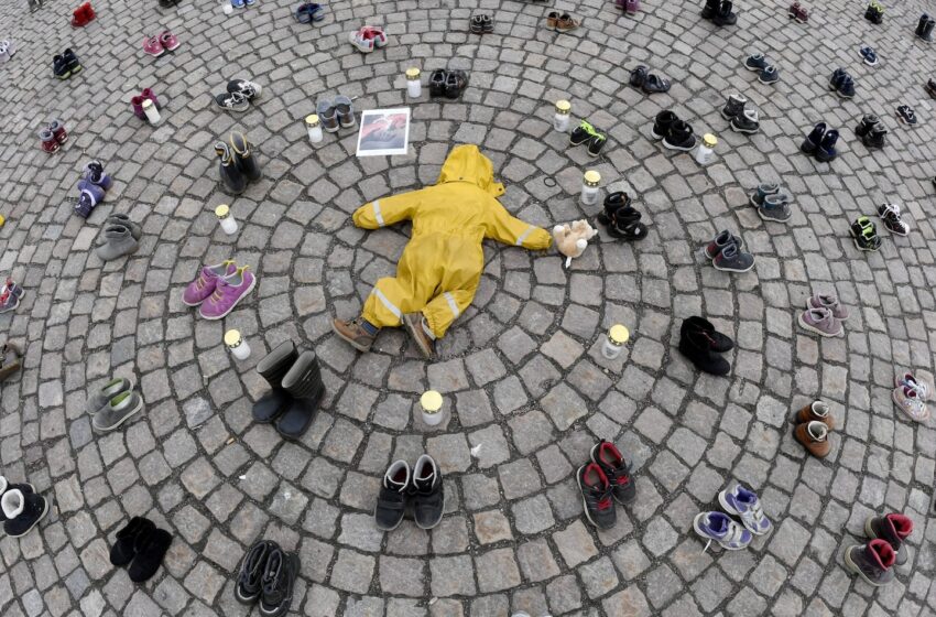  Hundreds of tiny shoes: Protest spotlights child death toll in Ukraine’s Mariupol