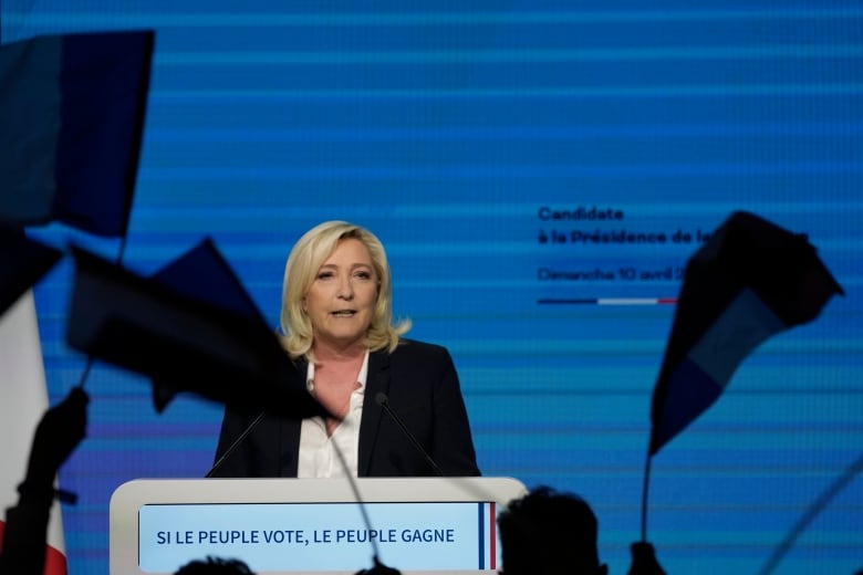  Macron and Le Pen headed for run-off vote to decide French presidential election, polls suggest