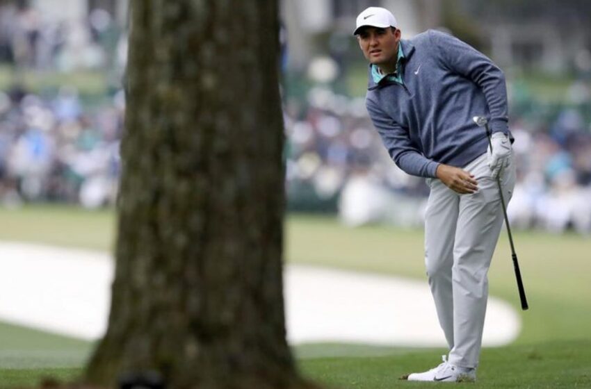  Scheffler survives wild, windy cold day to lead Masters by three