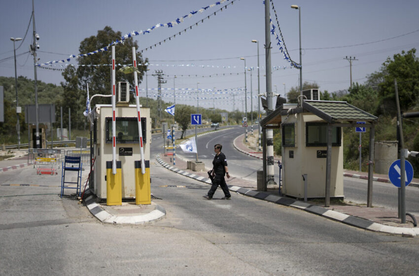 Security beefed up at Ariel as Israeli forces hunt for gunmen who killed guard