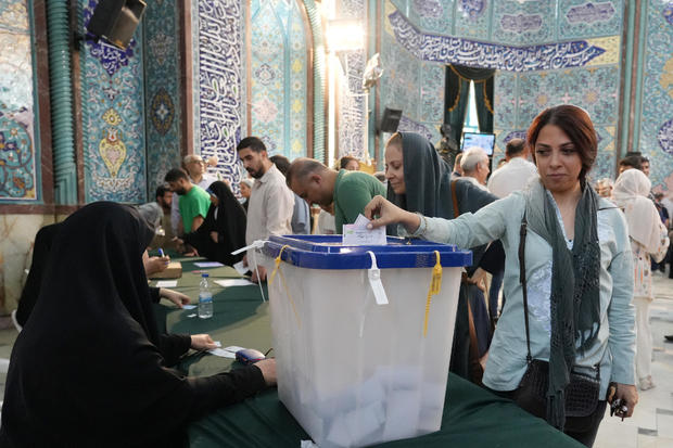  Iranians vote in a presidential election marked by widespread apathy